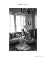bride by the window portrait photography