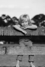 Boy at the Fence