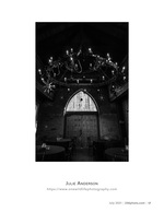 chandelier and arched door architecture photography