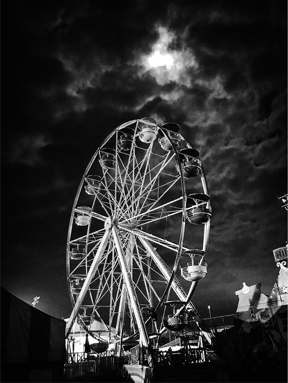 Ferris Wheel Under the Clouds