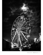 ferris wheel under the clouds silhouette photography