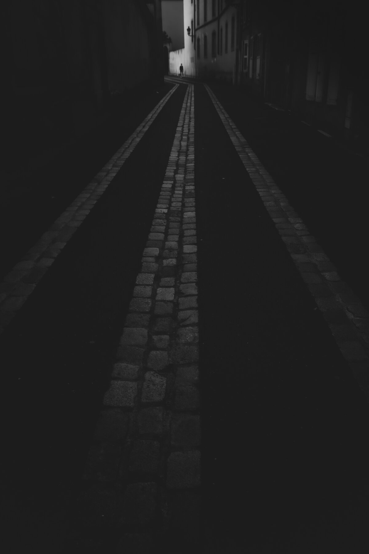 Solitary Figure in the Alley
