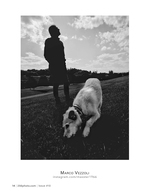 man and dog on the hillside pet photography
